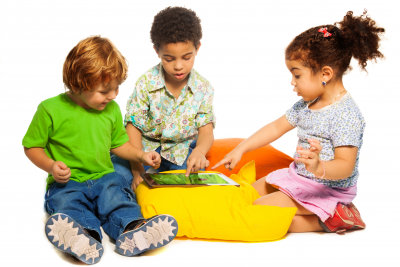 kids looking at the tablet device