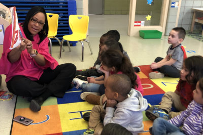 teacher with her students